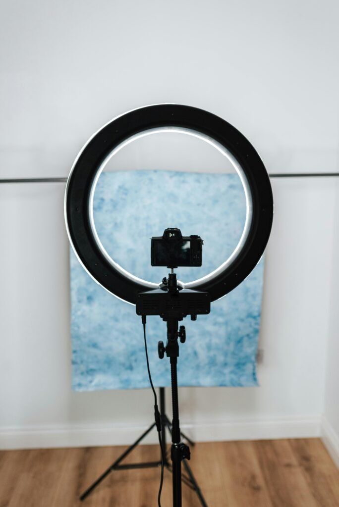 💡 Best Lighting Kits for Video Recording and YouTube Studios (2026 Amazon Guide) Explore a modern photography studio setup with a camera and ring light.